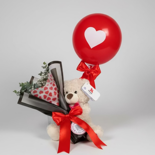Oso de peluche con ramo de flores y rosa roja